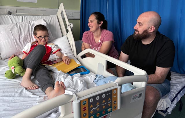 <p>Reece Wilton with Mum Elizabeth Wilton and Dad Ashley Wilton</p>